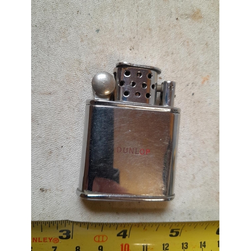 225 - Orlick Sport advertising Dunlop cigarette lighter in good order