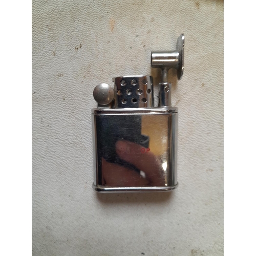 225 - Orlick Sport advertising Dunlop cigarette lighter in good order