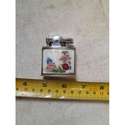 226 - Ronson silver jacketed pocket lighter with guilloche enamel floral decoration Pat 621570 note some m... 