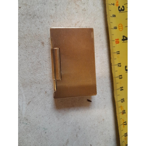 242 - 9 ct solid gold petrol lighter with engine turned decoration  ADB mark (Alfred Dunhill Brothers) and... 