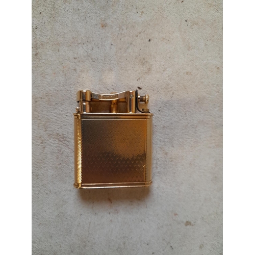 243 - Early Dunhill Unique Gents 9 ct solid gold petrol lighter with engine turned decoration, lift arm ac... 