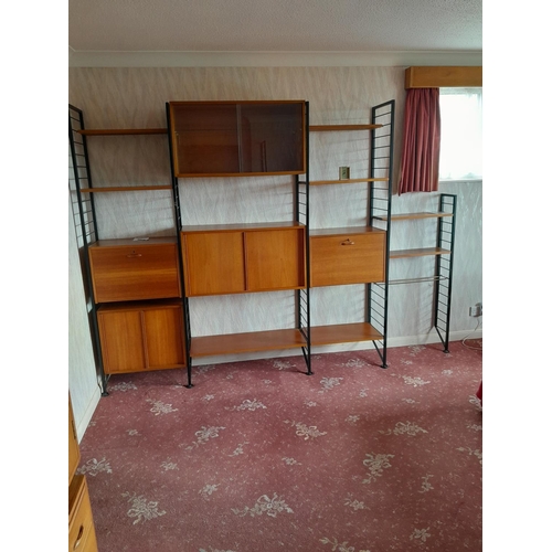 62 - Vintage Staples Teak modular units (Heals interest) comprising of : five x cabinets and various shel... 