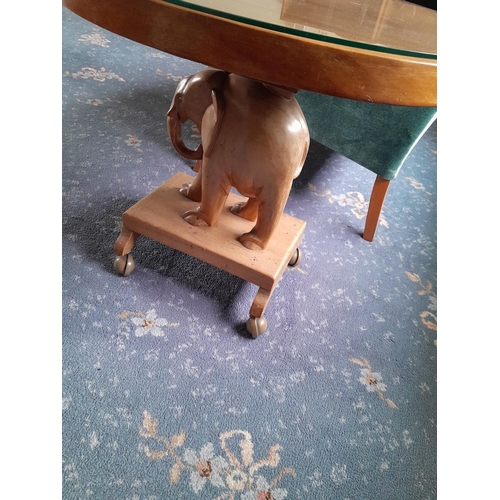 64 - Vintage teak coffee table with elephant base