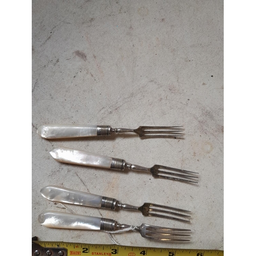 143 - Silver plated mother of pearl handled forks