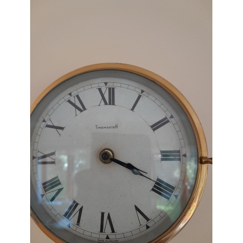 31 - 20th century brass cased ships clock by Time Master 17 cms in diameter