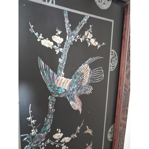 65 - Early 20th century mother of pearl inlaid Chinese panel with carved frame depicting birds of paradis... 