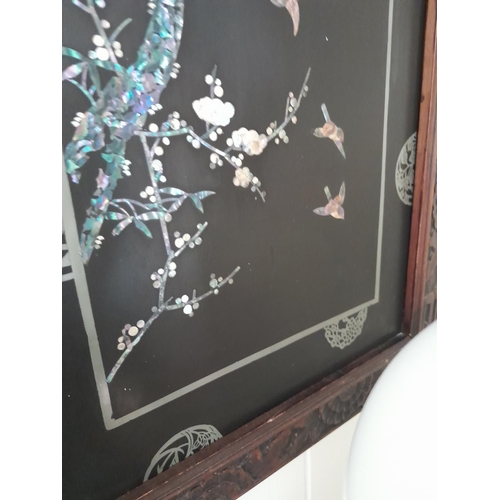 65 - Early 20th century mother of pearl inlaid Chinese panel with carved frame depicting birds of paradis... 