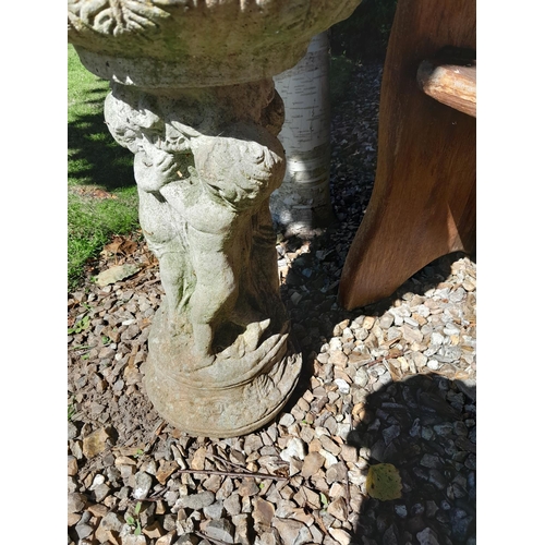 70 - Composite stone three cherub bird bath 55 cms x 30 cms