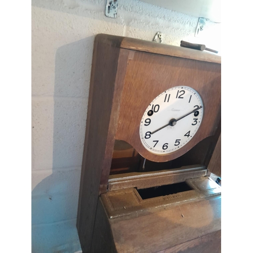 77 - Vintage Gensign clocking in clock in oak case with key