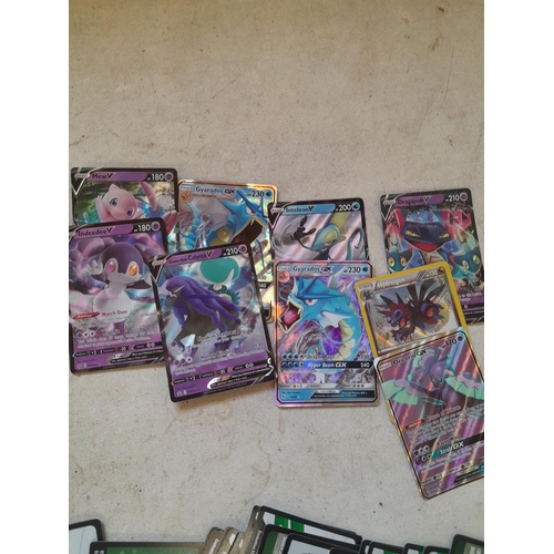 142 - Pokemon trading cards and tins