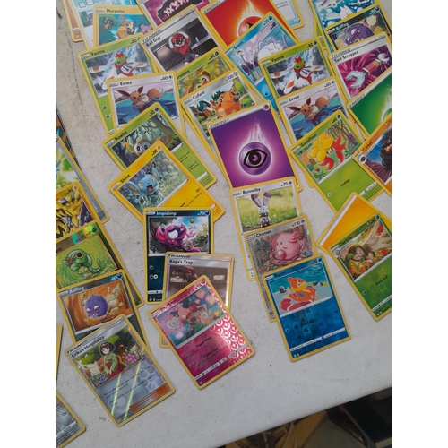 143 - Pokemon trading cards and tins