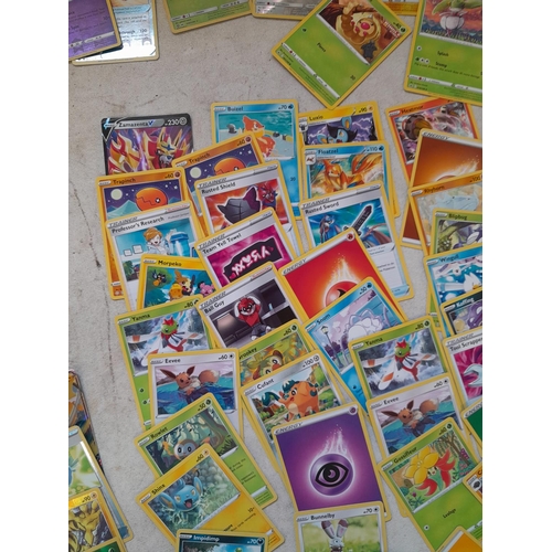 143 - Pokemon trading cards and tins