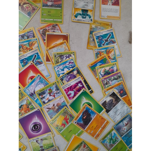 143 - Pokemon trading cards and tins