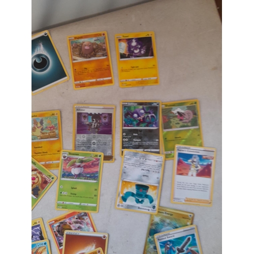 143 - Pokemon trading cards and tins