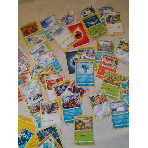 144 - Pokemon trading cards and tins