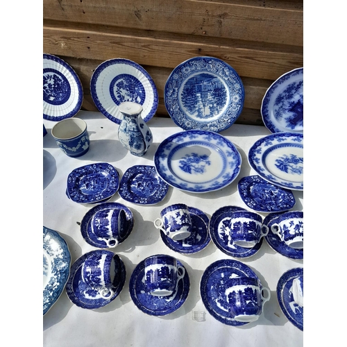 173 - Large array of blue and white china : Victorian flow blue plates, part tea set, some with damages ma... 