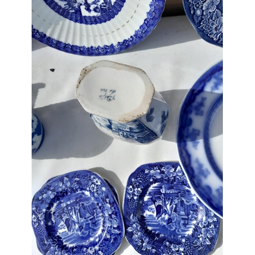 173 - Large array of blue and white china : Victorian flow blue plates, part tea set, some with damages ma... 