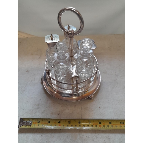 221 - Early 20th century silver plated cruet in good order, one top loose