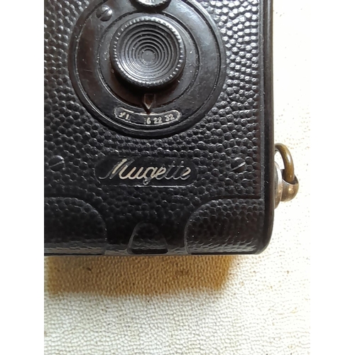 436 - Vintage Mugette camera pocket petrol lighter, note damage