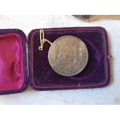 263 - Costume jewellery and USA 1890 Silver dollar with unmarked but tested mounts for a brooch with guard... 