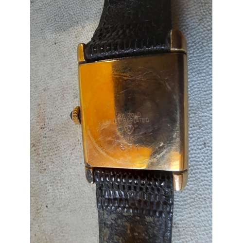 11 - Vintage ladies wristwatch : Raymond Weil in 18kt PLATED gold case with leather strap