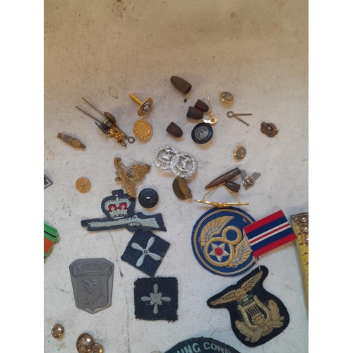 42 - Various military cap badges, pin badges, lapel badges etc.