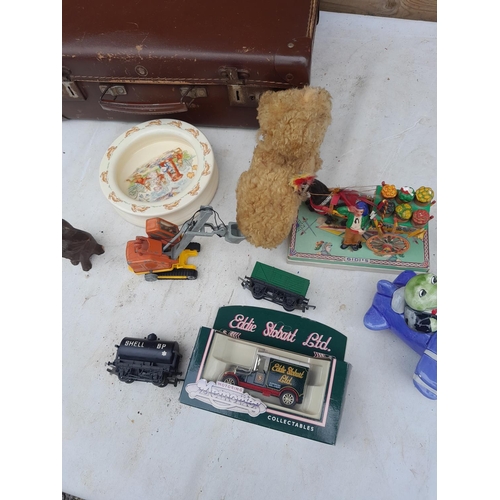 273 - Vintage suitcase of oddments : toys, die cast, Doulton Bunnykins etc.