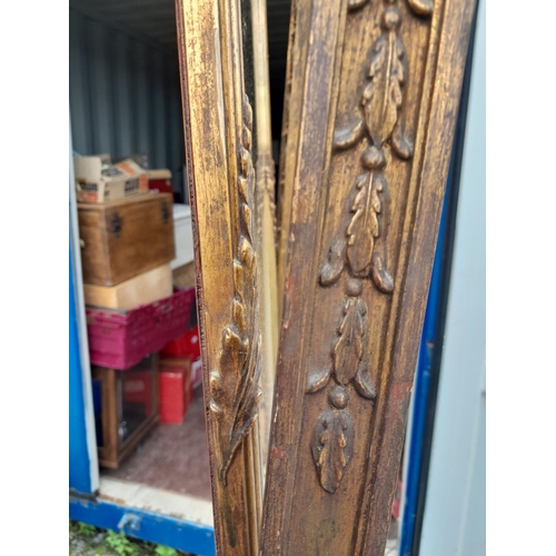 284 - Very early 20th century gilt and gesso cheval mirror, profusely decorated either side with Neo Class... 