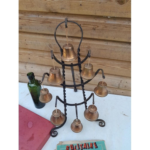 361 - Vintage burnished copper chiming bells in wrought iron stand and vintage toys