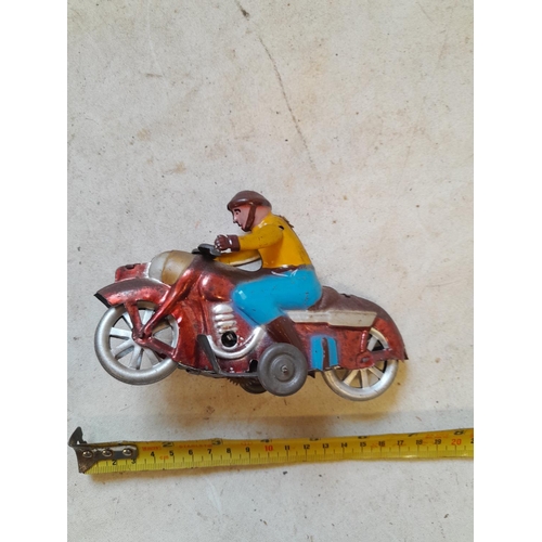 448 - Vintage  Tin-plate clockwork Motorcycle & Rider Toy from the 1960s