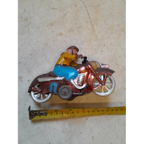 448 - Vintage  Tin-plate clockwork Motorcycle & Rider Toy from the 1960s