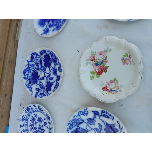 656 - Victorian flow blue and white plates, some crazing, some in good order