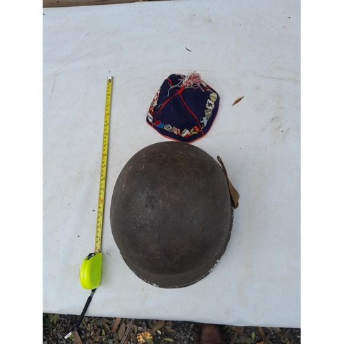 60 - World War II era US field helmet & night hat