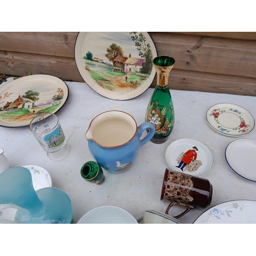 86 - Decorative china  : Cracked hand decorated Torquay ware plates, green enamel Italian glass etc.