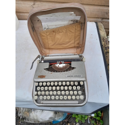 104 - Vintage typewriter and sewing machine