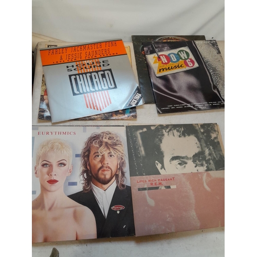 107 - Vinyl record albums and singles : The Stranglers, INX, Buddy Holly, Rolling Stones, REM , Michael Ja... 