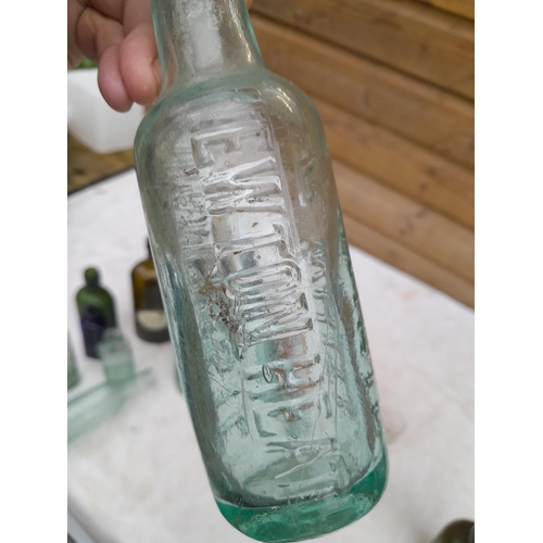 213 - Collection of advertising and other bottles : Morton Chemist, R Whites, Newton Heat