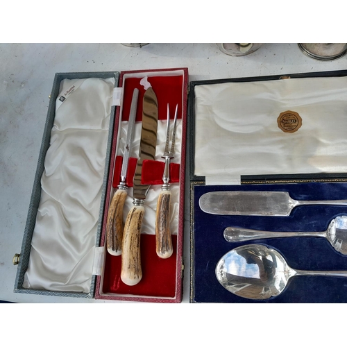 219 - Assorted silver plated presentation cases of cutlery & 4 x collectors wall plates with steam train t... 