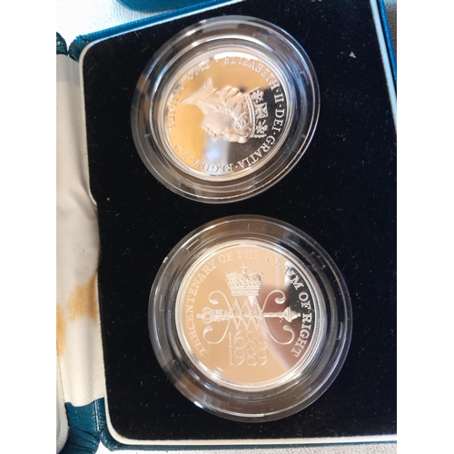 239 - 2 x Royal Mint Silver Proof Coin Sets : 1 x £1 coin , 2 x £2 coin