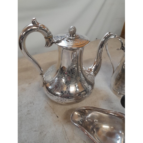 259 - Assorted silver plated ware, teapots, sauce boat etc.