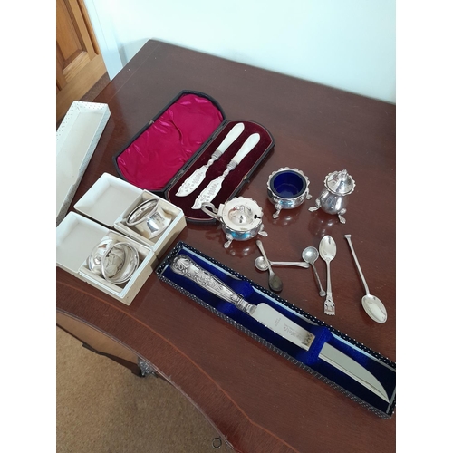 297 - 2 x silver  serviette rings, 2 x silver tea spoons, plated salts, silver handled knife etc.