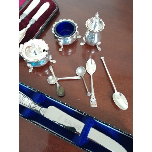 297 - 2 x silver  serviette rings, 2 x silver tea spoons, plated salts, silver handled knife etc.