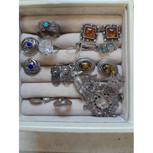 313 - Costume jewellery : silver and amber earring, silver medallion etc.