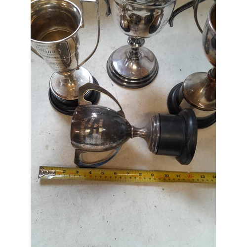 513 - 4 x silver plated trophies