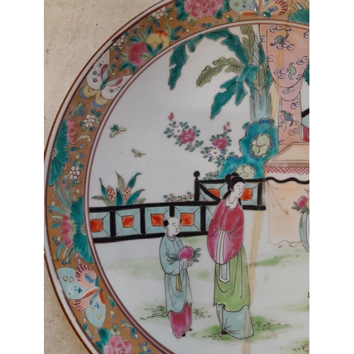 53 - 19th century Chinese Famille Rose plate signed underneath, note restoration