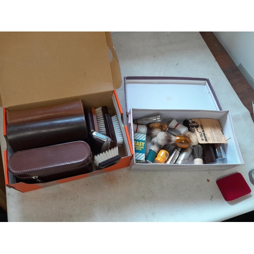 76 - 2 z shoe boxes of shaving related items