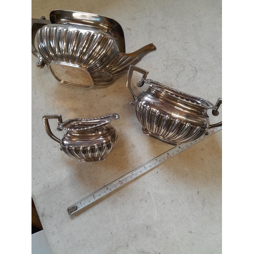 96 - Solid silver Neo Classical teaset comprising of teapot, sugar bowl and cream jug with Lions head in ... 