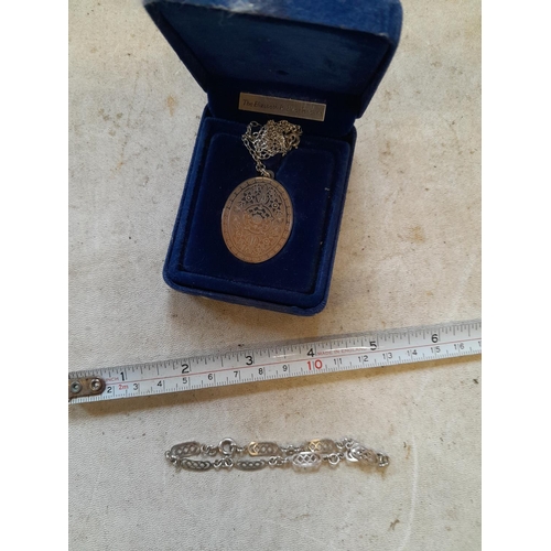 106 - QEII commemorative silver pendant and silver bracelet