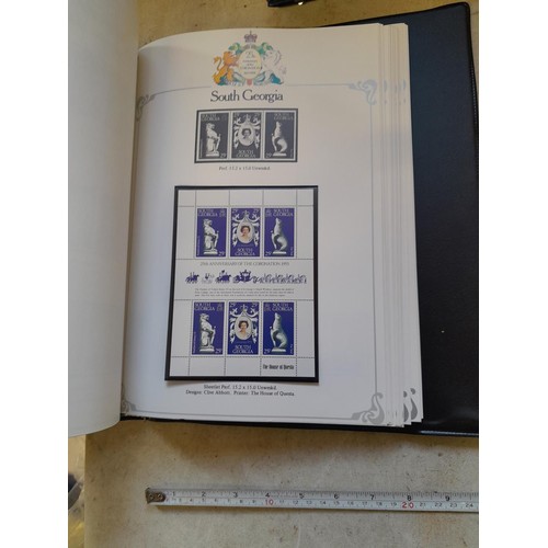 120 - Stamps :  25th Anniversary of the Coronation Commemorative stamp albums, 2 x sparsely filled albums ... 