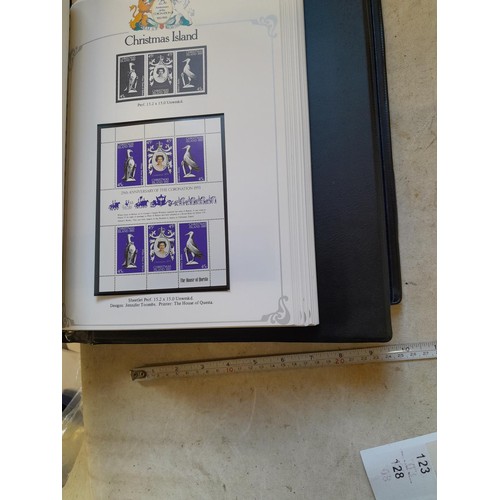 120 - Stamps :  25th Anniversary of the Coronation Commemorative stamp albums, 2 x sparsely filled albums ... 